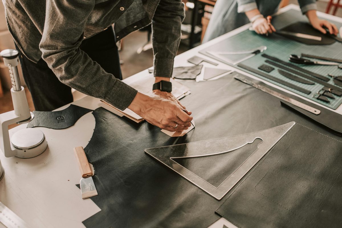 Leather craftsperson working in a UK workshop